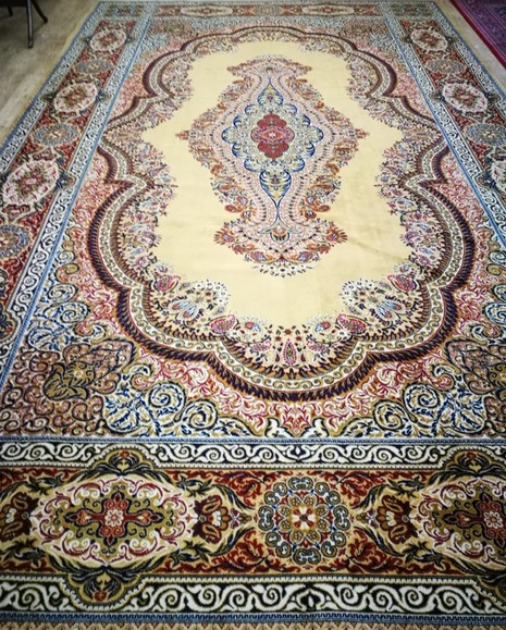 A large Wilton Persian design cream ground carpet 490 x 300cm